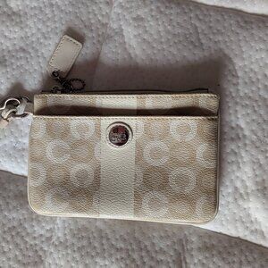 Coach Signature Op Art Wristlet Beige Cream with Purple Lining